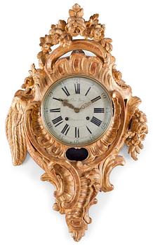 623. A Swedish Rococo gilt wood wall clock by C. Berg.