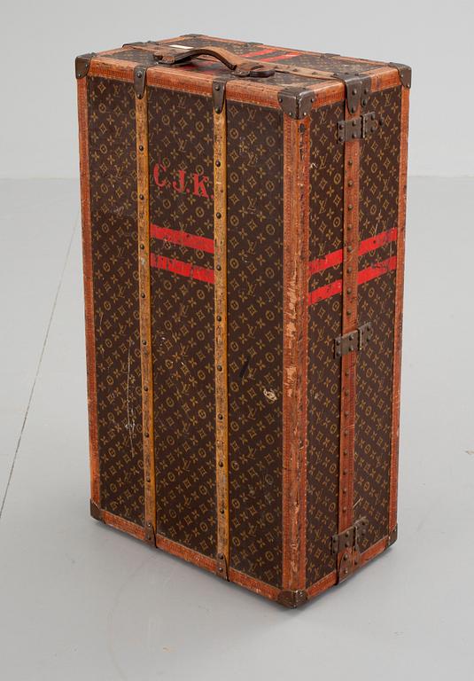An early 20th cent monogram canvas trunk by Louis Vuitton.