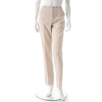 HERMÈS, a pair of creme colored silk pants.