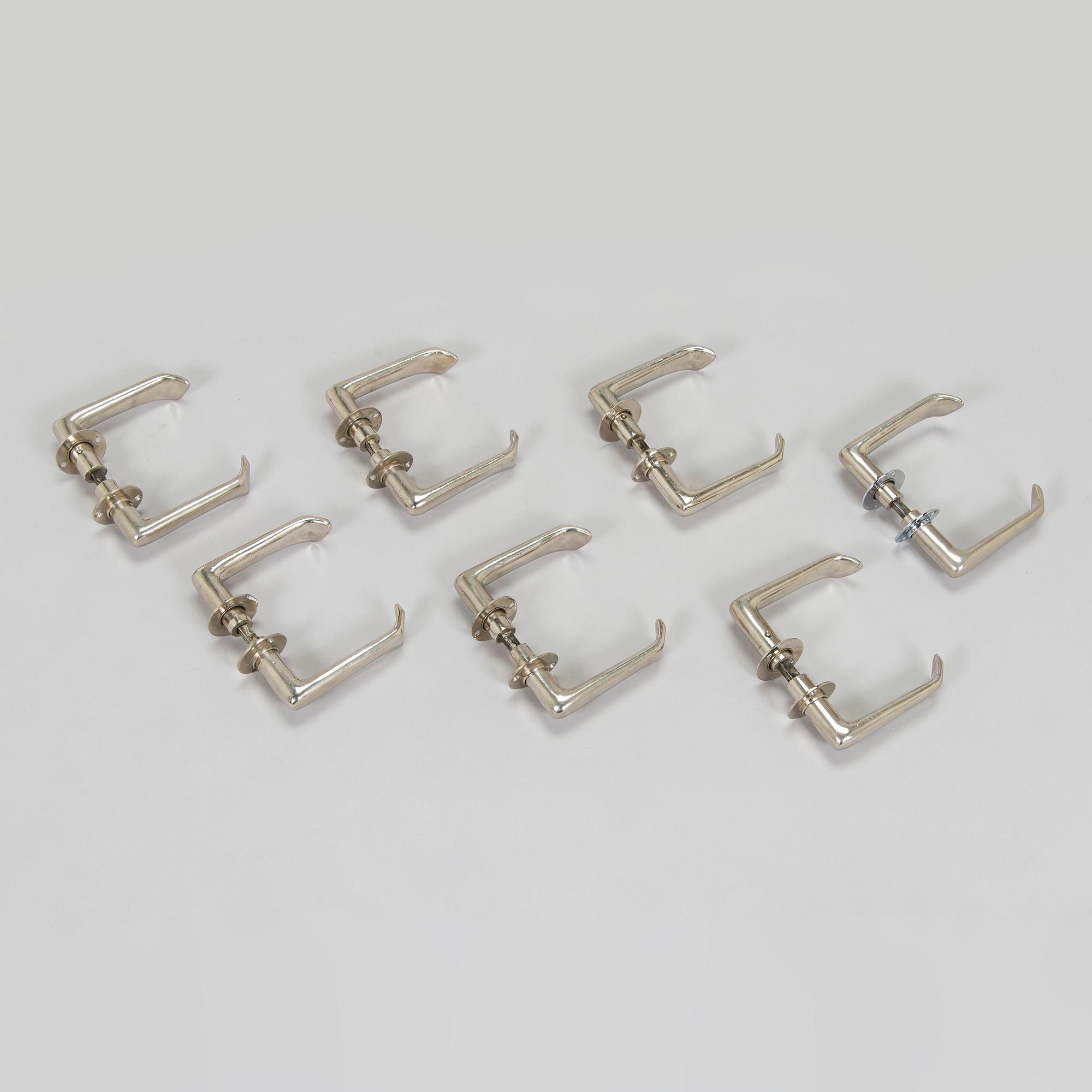 Alvar Aalto, seven paris of mid-20th century doorhandles manufactured by Kellokosken Tehdas, Finland.
