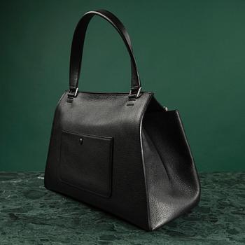 HANDBAG, "Large Edge Bag", Céline, 2013. Black leather with silver-tone hardware, pocket at back with snap closure.