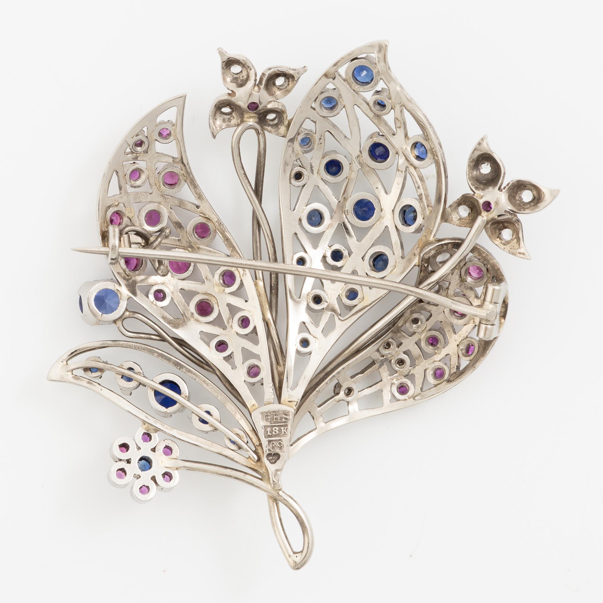 Brooch 18K white gold with white stones and coloured stones. Gerdt Sandqvist, Stockholm 1953.