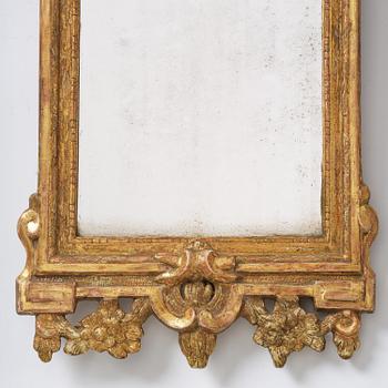 A Swedish rococo giltwood mirror, Stockholm, later part 18th century.