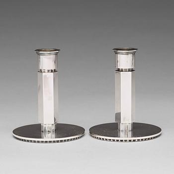 162. Wiwen Nilsson, a pair of sterling candlesticks, Lund, Sweden 1948 and 1956.