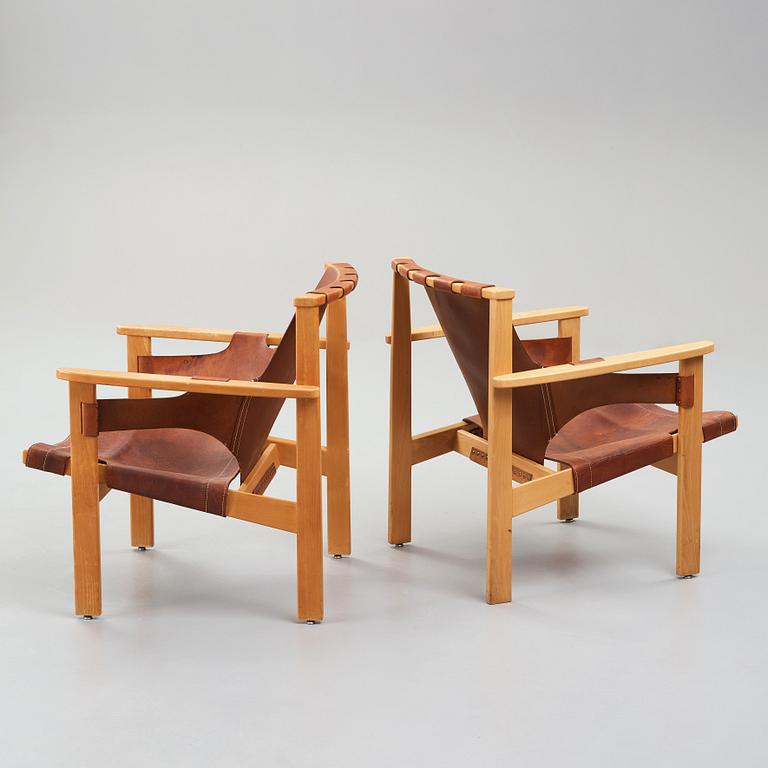 CARL-AXEL ACKING, a pair of 'Trienna' easy chairs, Källemo Sweden.