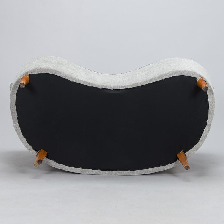 A mid-20th century sofa.