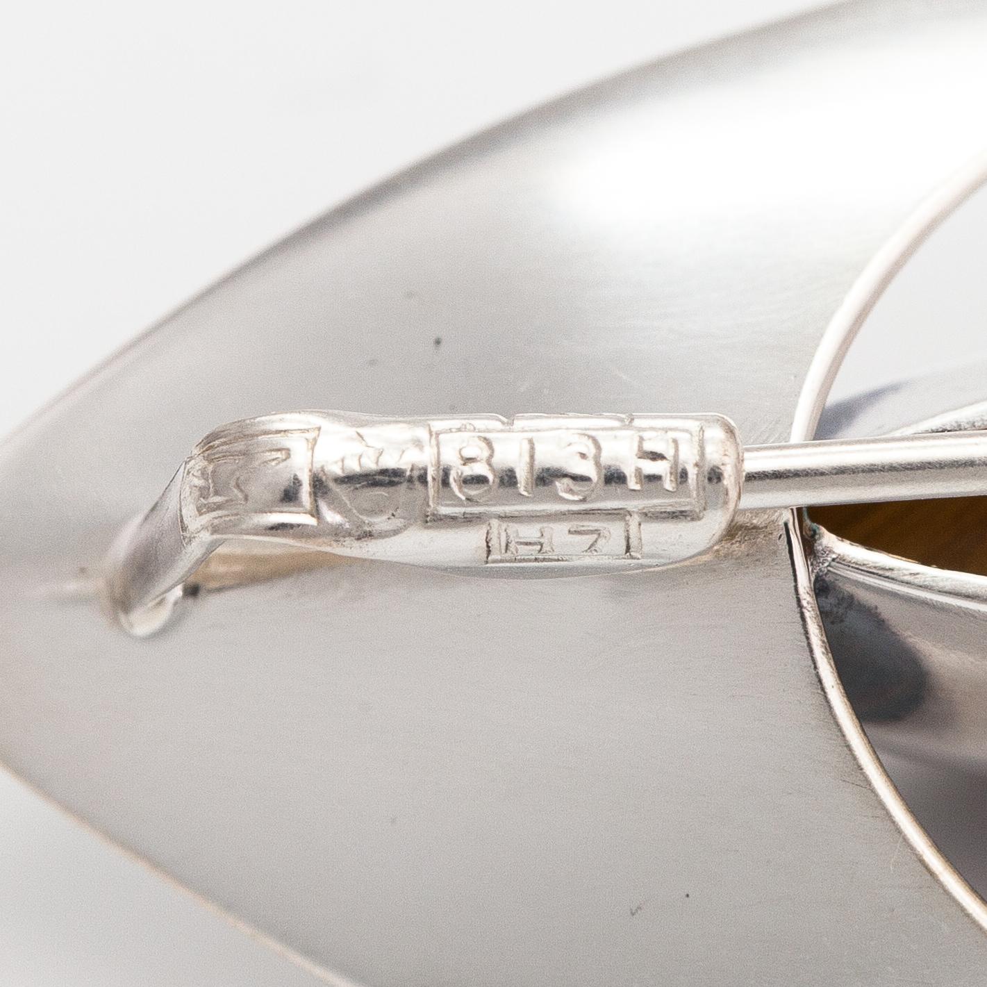 Elis Kauppi, Two silver broocher, with an aventurine quartz and tiger's eye. Kupittaan kulta, Turku 1959 and 1961.