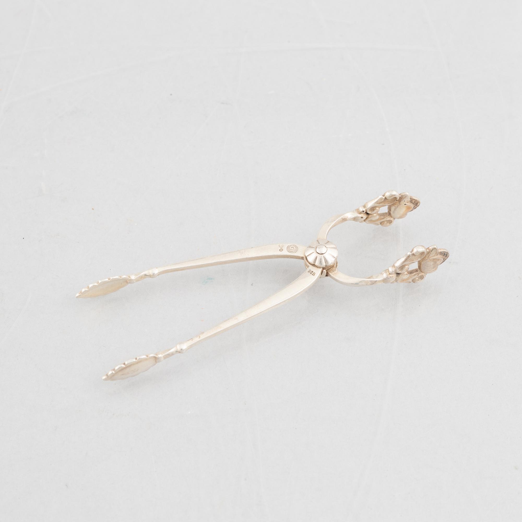 Sugar box, silver 830, Swedish import mark, and sugar tongs, sterling silver, Georg Jensen, Denmark.