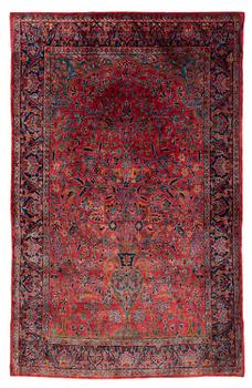 402. An antique Manchester Kashan rug, c. 197 x 126 cm.