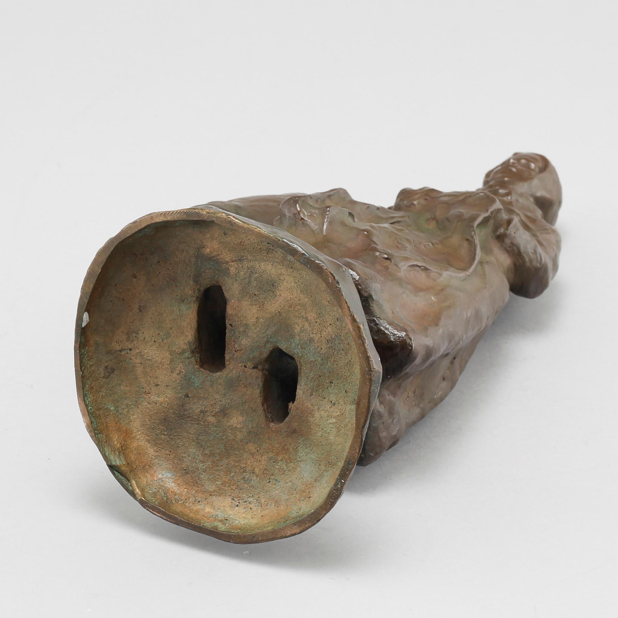 a bronze sculpture, signed and dated 1906.