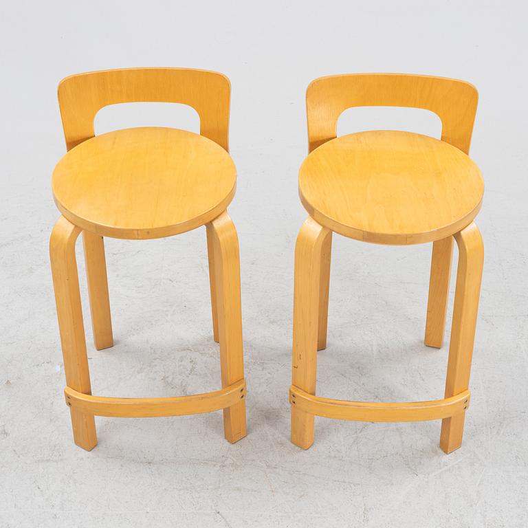 Alvar Aalto, two model 'K65' bar stools, Artek, Finland.