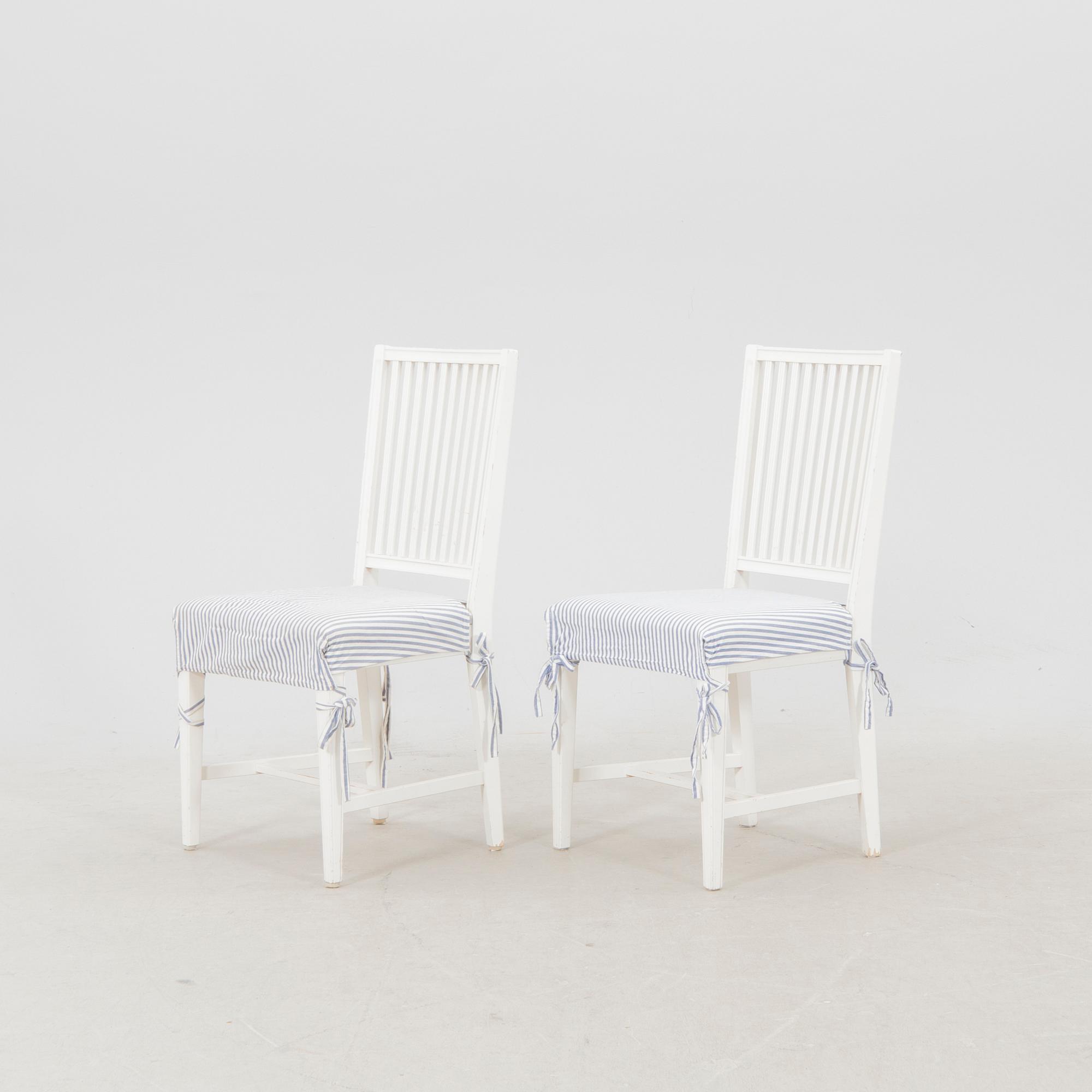 A set of 10 painted Gustavian style chairs from IKEA later part of the 20th century.