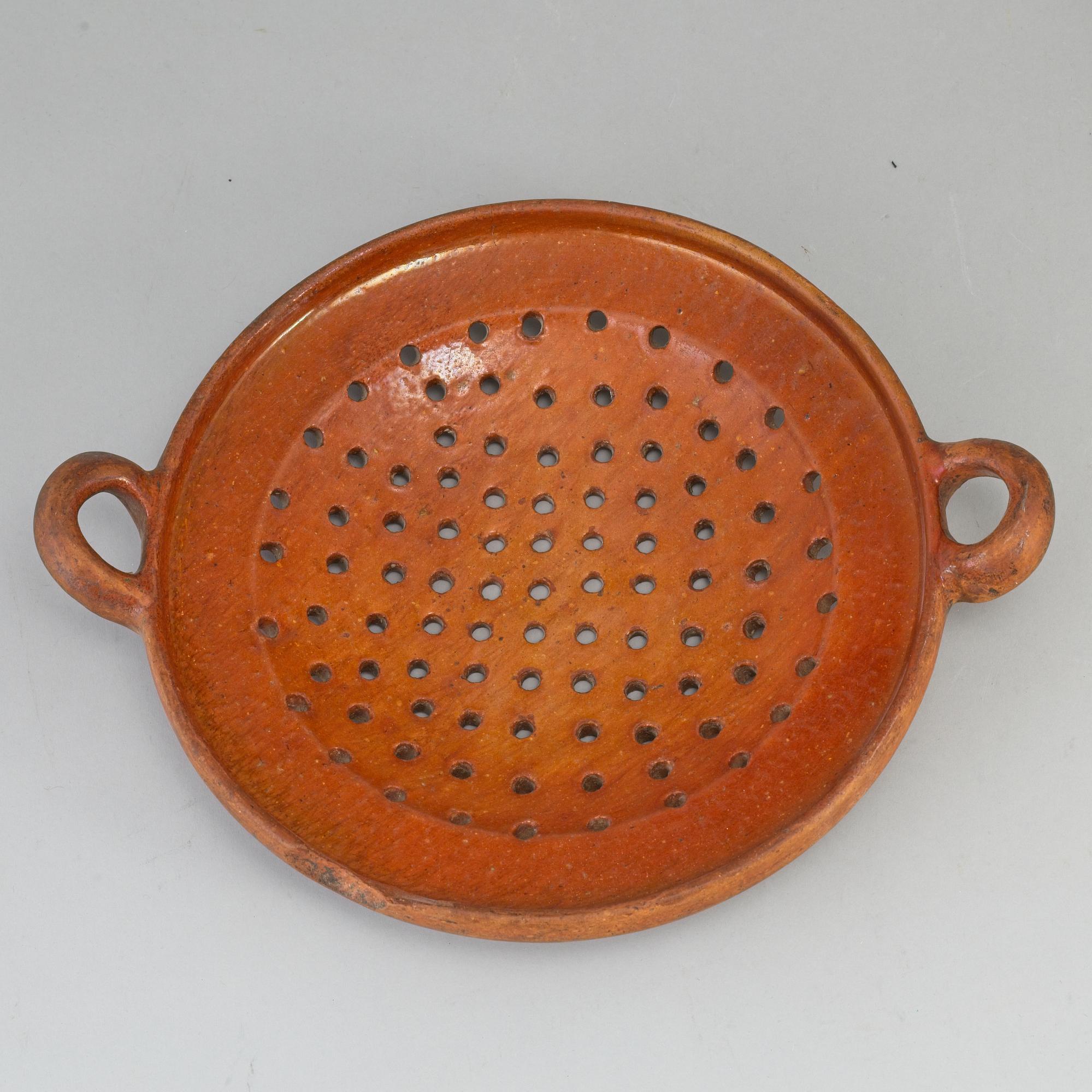 Two pottery strainers, 19th Century, Sweden.