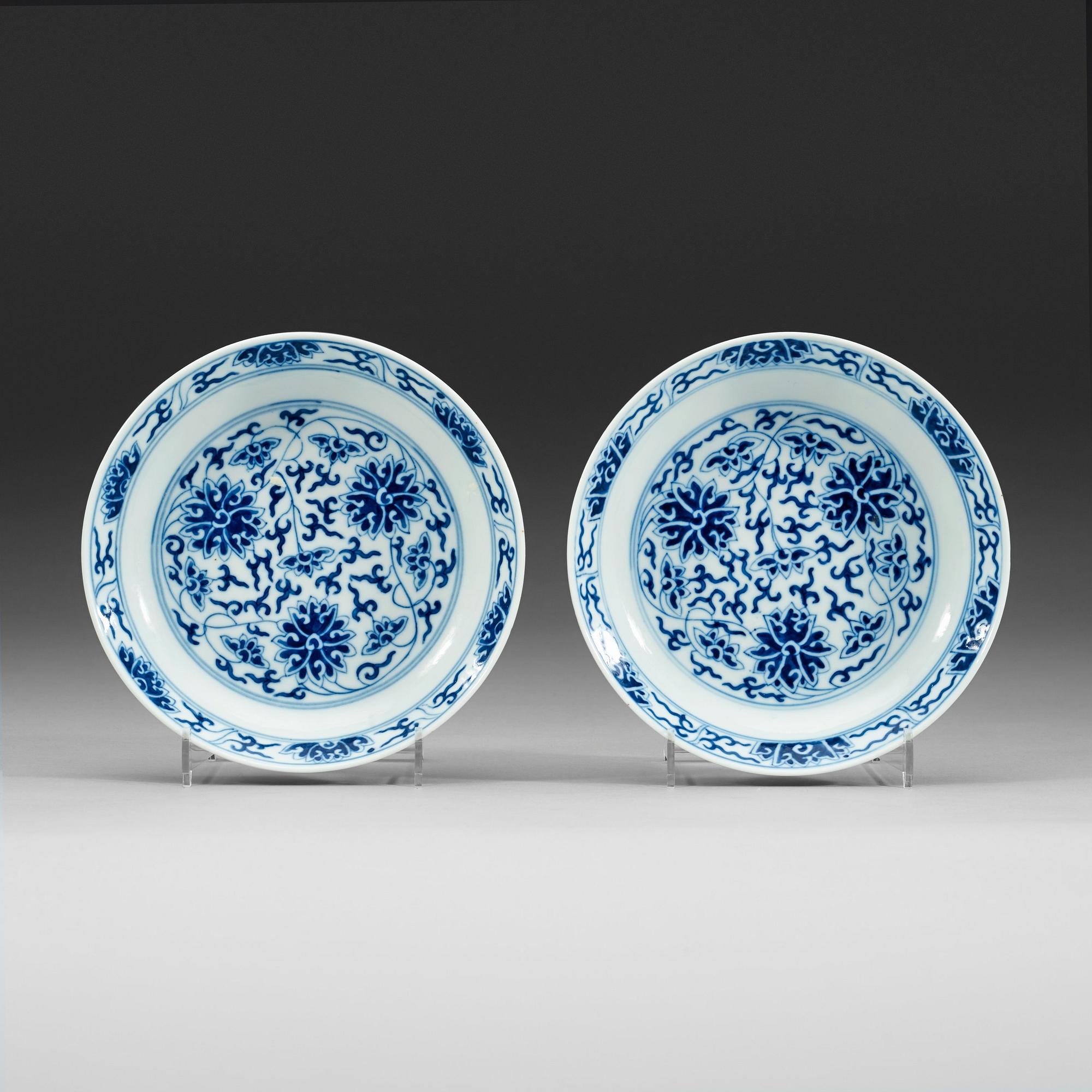 A pair of blue and white lotus dishes, Qing dynasty, Guangxu mark and period (1874-1908).