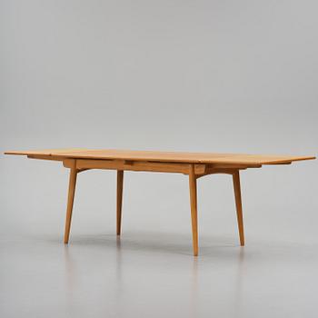 Hans J. Wegner, an "AT-312" dining table, Andreas Tuck, Denmark, 1950s-60s.