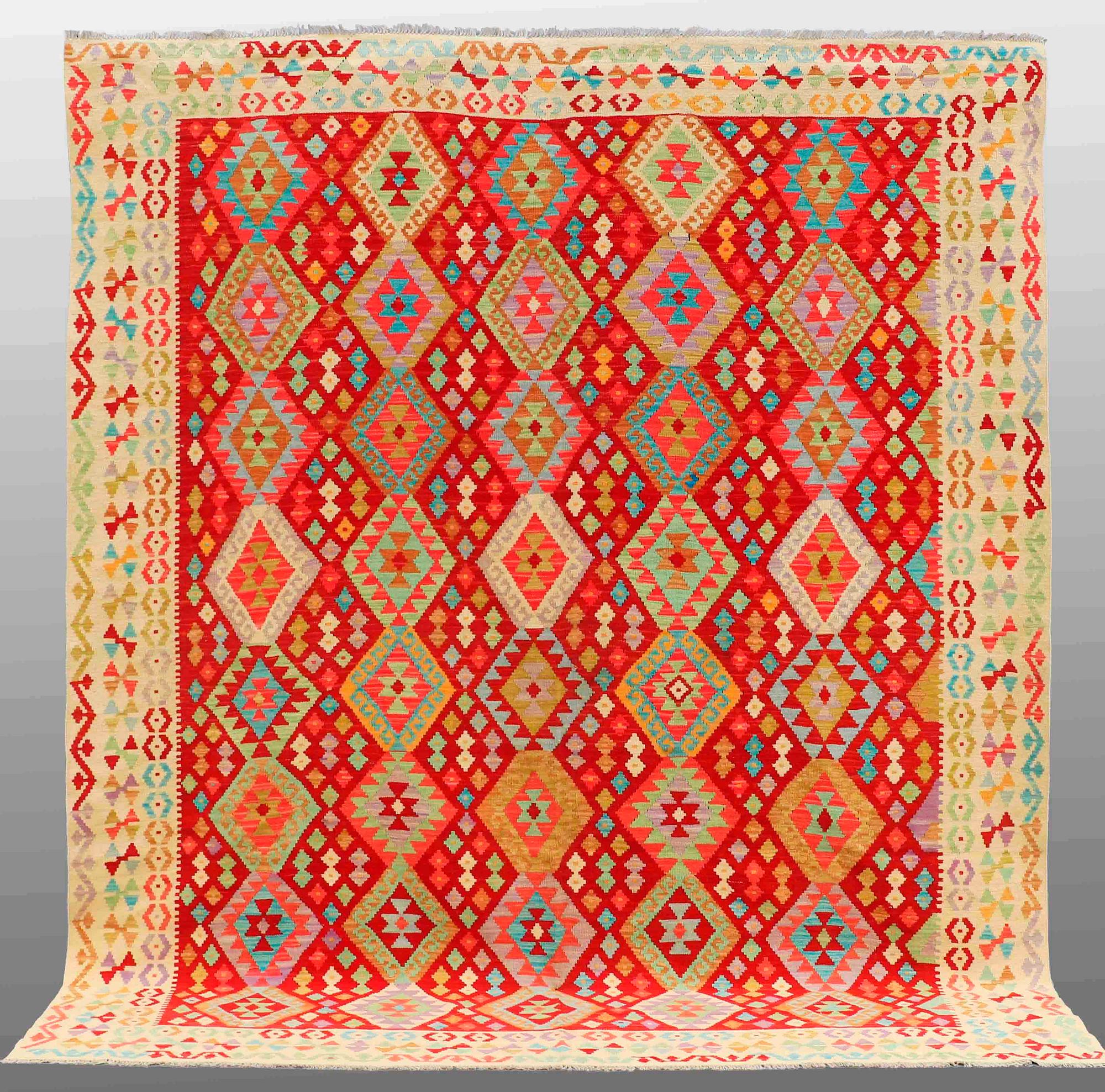 A CARPET, Kilim, ca 297 x 257 cm.