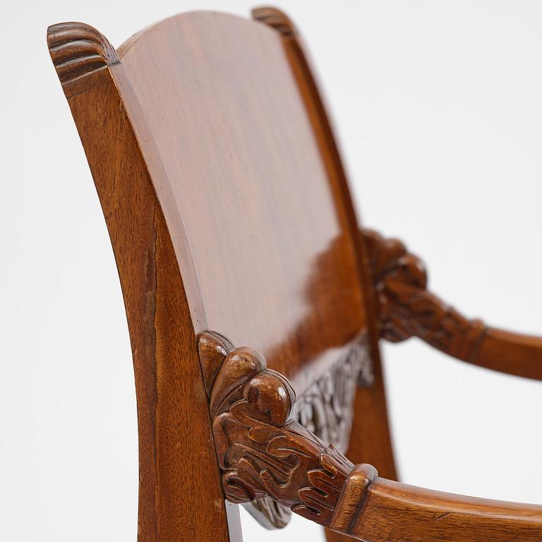 A pair of Baltic / Russian mahogany Empire armchairs, first part 19th century.
