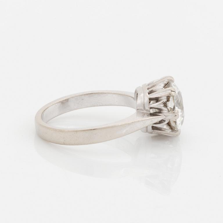 An 18K white gold ring set with a cushion formed old cut-diamond.