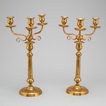 a pair of 19th century brass candelabras, model 43, Skultuna.