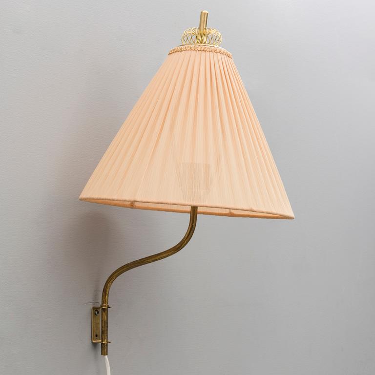 A mid 20th century wall light marked Idman, Finland.