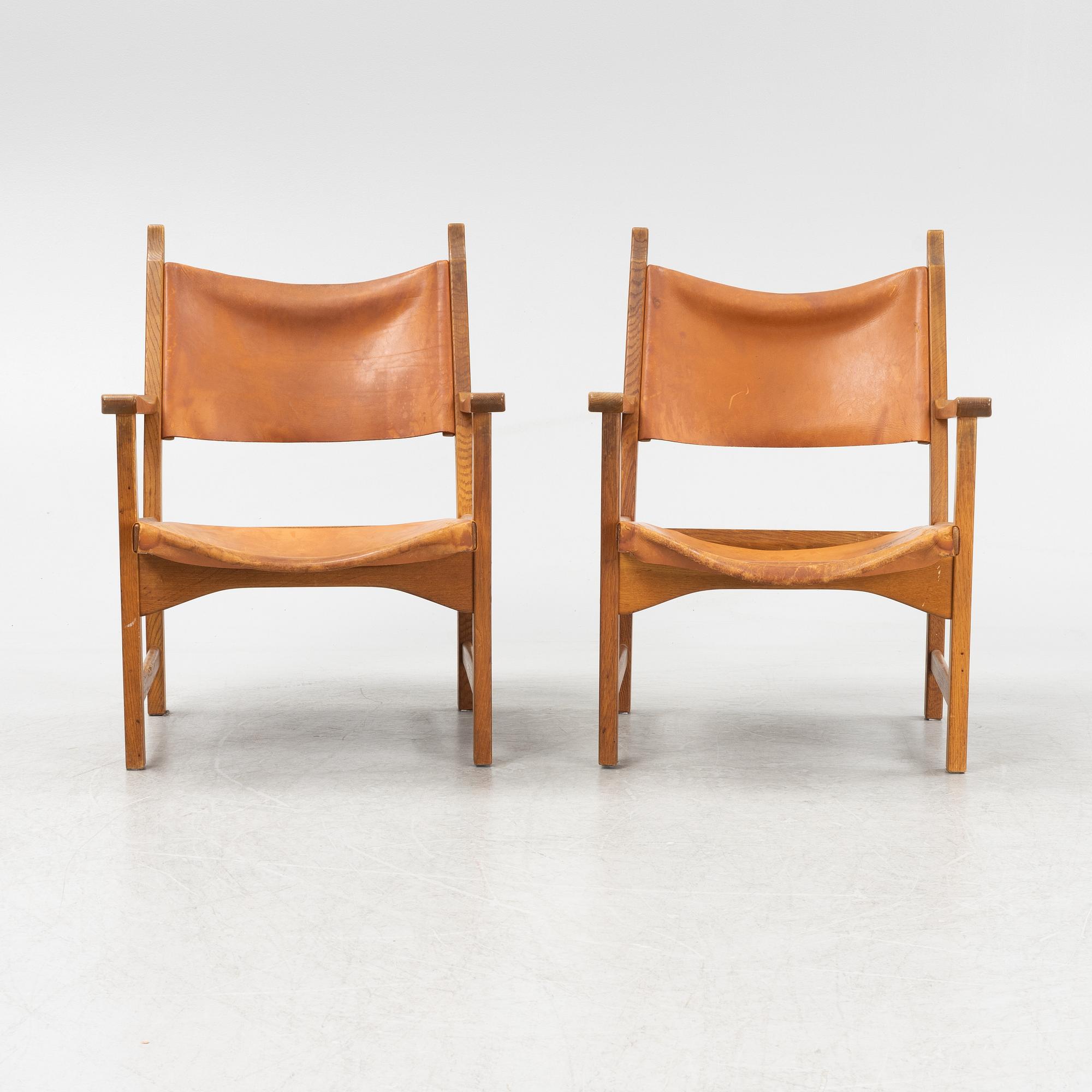 Carl Malmström & Yngve Ekström, a pair of 'Caryngo' oak armchairs, Swedese, second half of the 20th century.