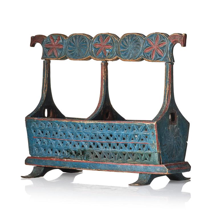 A Swedish folk art carved and painted bobin-holder, circa 1800.