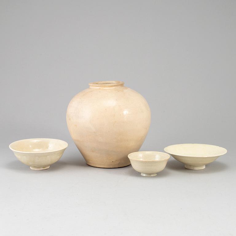 A group of white glazed South East Asian Ceramics, 20th Century or earlier. (4 pieces).
