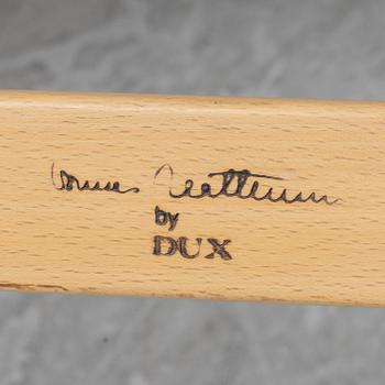 An 'Eva' easy chair by Bruno Mathsson for Dux.