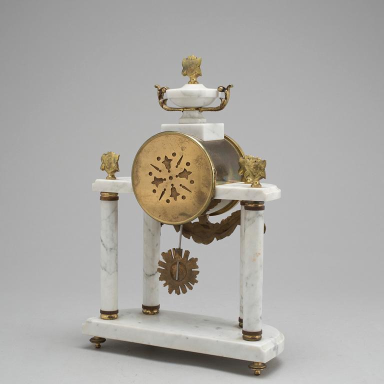 A French marble mentle clock, first half of the 20th Century.