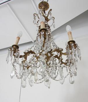 LJUSKRONA, nyrokokostil. H 74.
Proveniens: Git Gay.