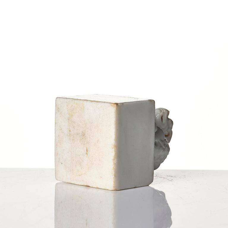 Two seal stamps, soapstone and blanc de chine. Qing dynasty 18th/19th century.