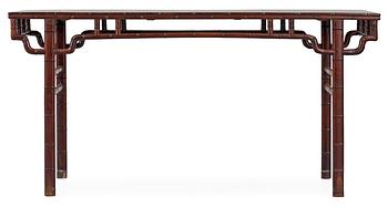 1306. A hardwood free standing table, Qing dynasty.