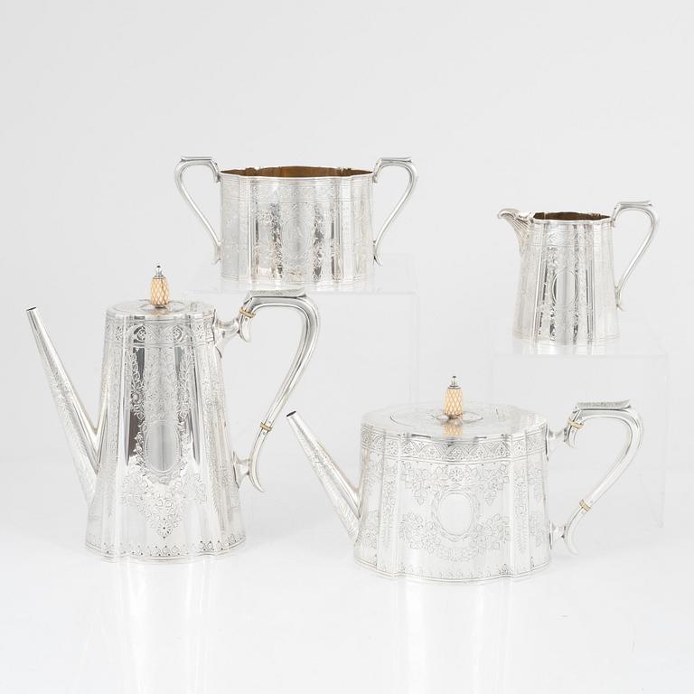 An English Silver Coffee Pot, Teapot, Creamer and Sugar Bowl, mark of Walker & Hall (John Edward Bingham) Sheffield 1891.