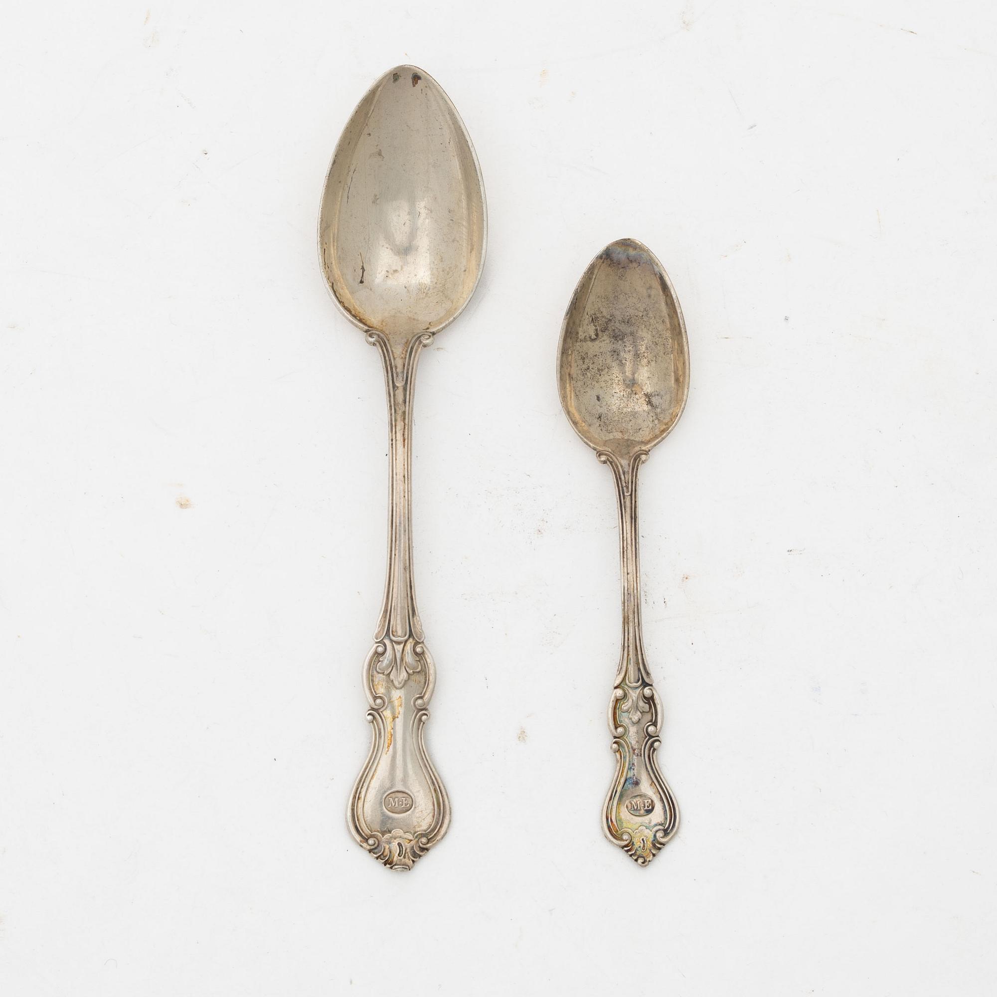 Skedar, 23 st, silver, "Olga", CG Hallberg, Stockholm 1910.