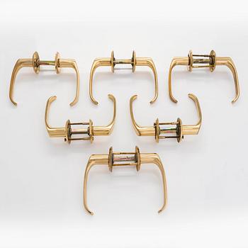 A set of six 1960s-70s door handles.