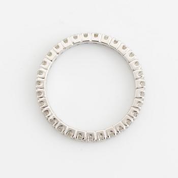 Brilliant cut diamond eternity ring.