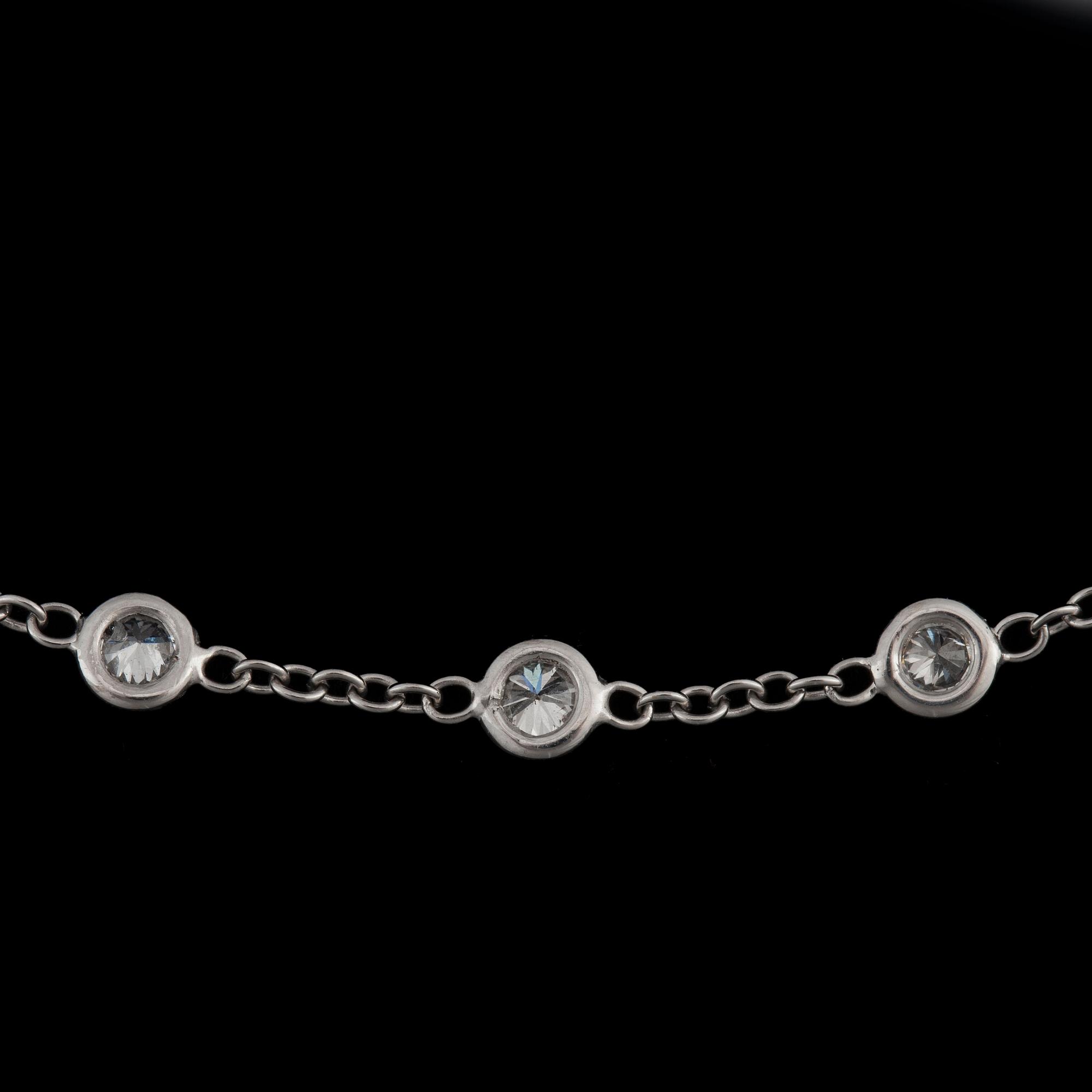 A brilliant-cut diamond longchain necklace. 82 diamonds, total carat weight circa 8.96 cts.