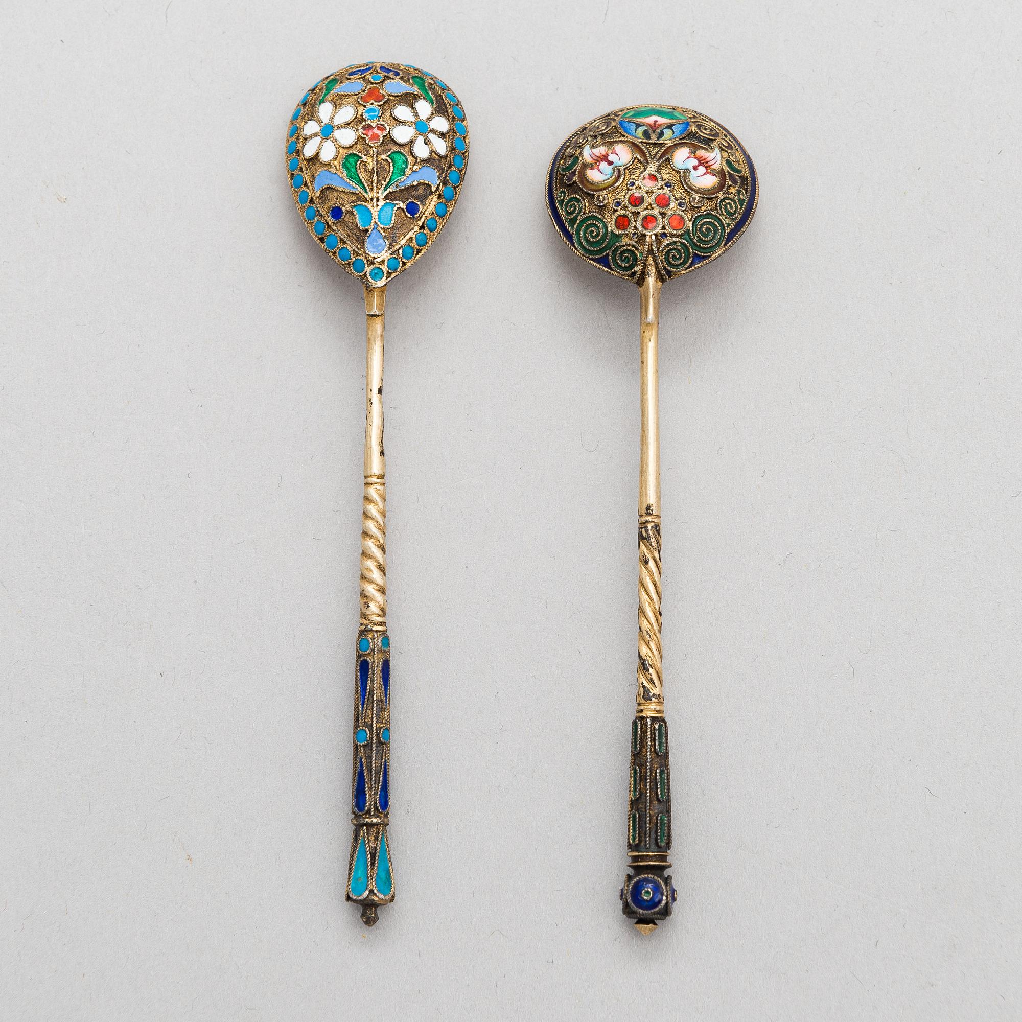 A salt cellar, mark of D. Nikitin, and 2 spoons, poss. P. Abrosimov and M. Andreyevna, enamel, silver. Moscow 1899-1908.