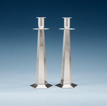 646. A pair of Wiwen Nilsson sterling candle sticks, Lund 1952 -56.