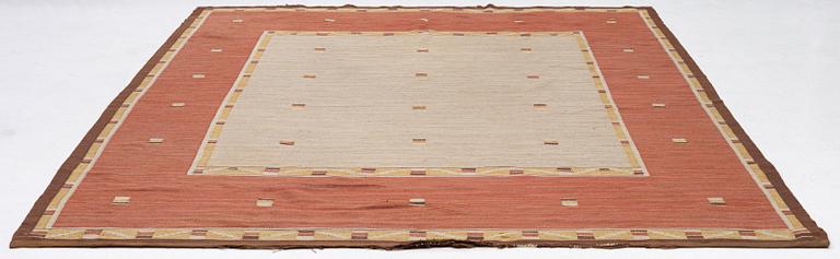 A flat weave carpet, c. 360 x 265 cm.