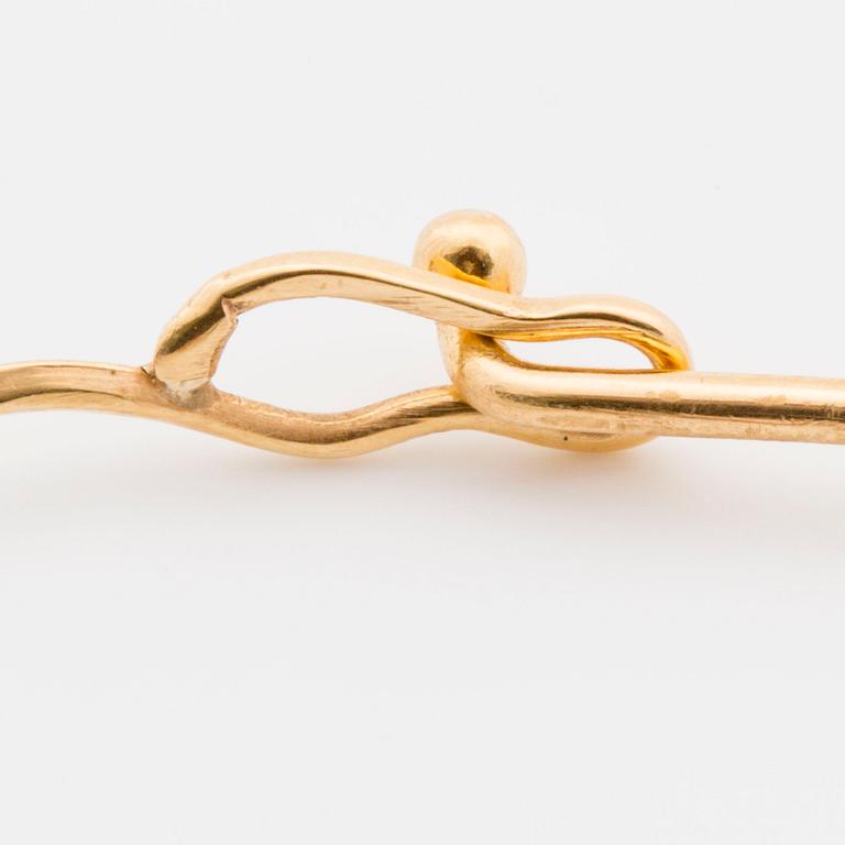 A Elon Arenhill collier with faceted rock crystal.