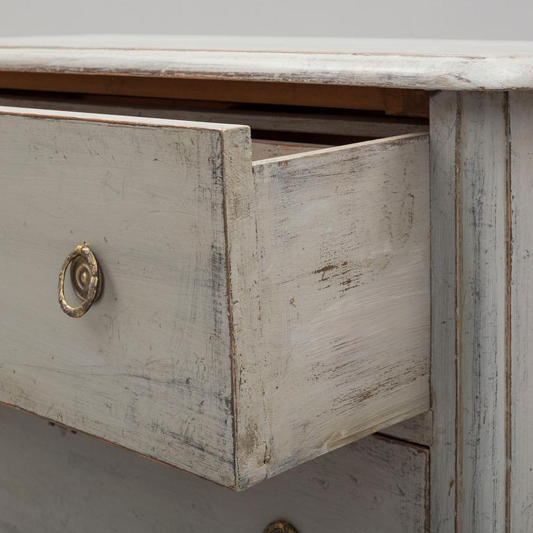A mid 19th century painted chest of drawers.