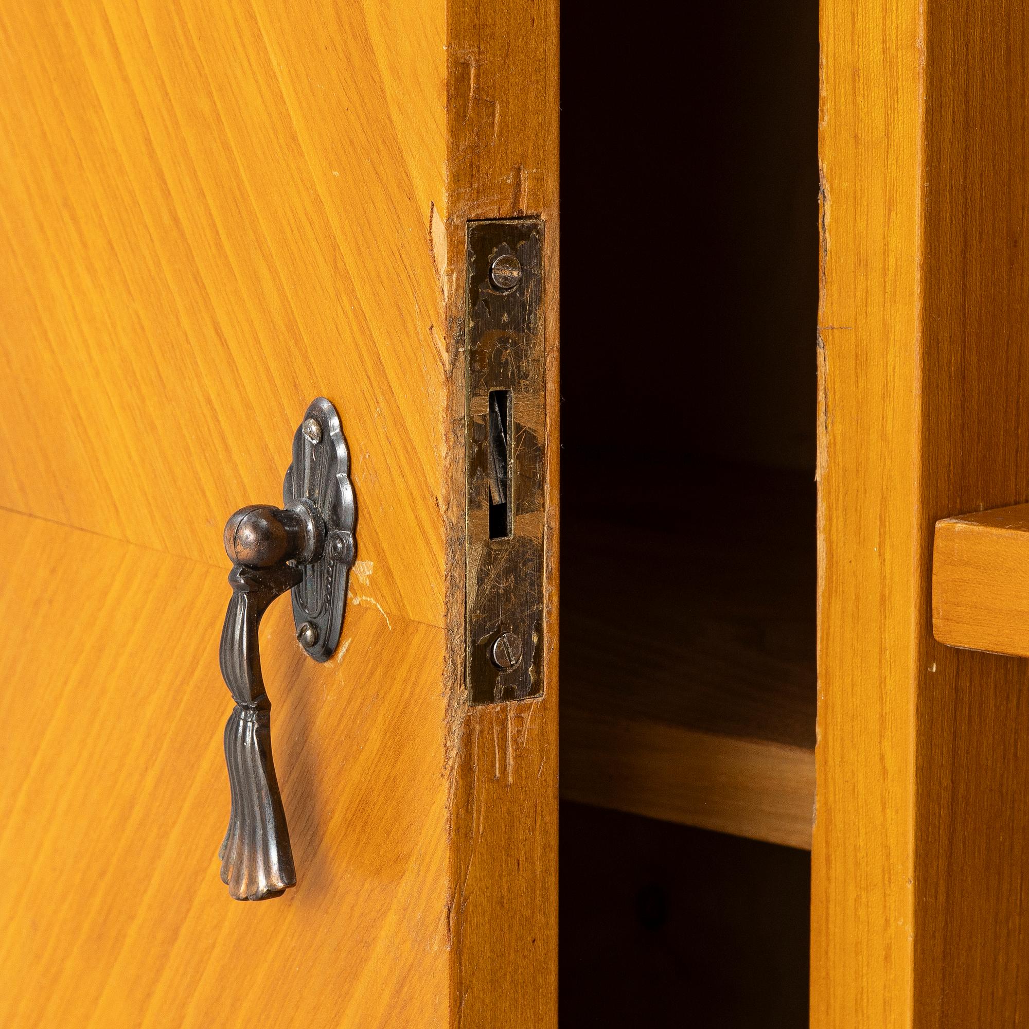 A bookcase with cabinet, Sweden, 1930s/40s.
