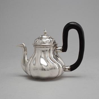 An 18th century silver tea pot, unidentified makers mark, Northern Europe.