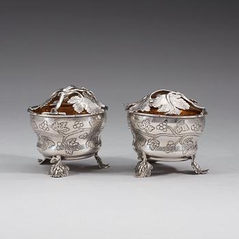 A pair of German 18th century parcel gilt jelly-pots, marks of  Johann Christoph Seelingslow, Magdeburg.