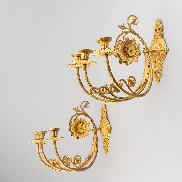 A pair of wall sconces from the late 19th century.