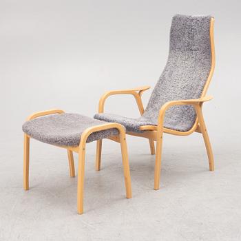 Yngve Ekström, armchair with footstool, "Lamino", Swedese, 2007.