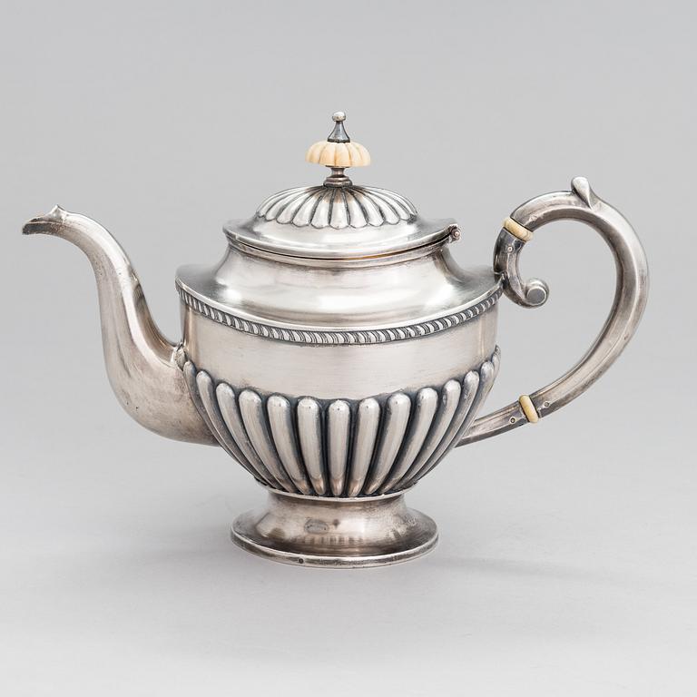 A Russian silver teapot, mark of Ljubavin under the Imperial warrant mark, Swedish control marks.