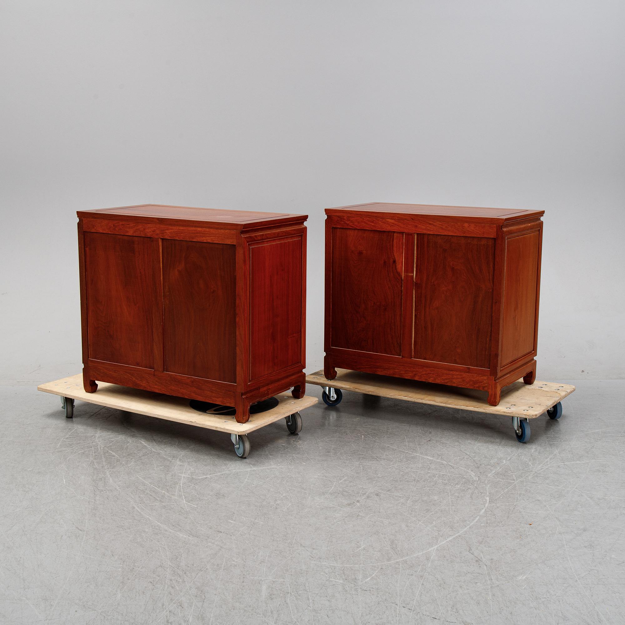 A pair of cupboards or sideboards, Yuen Cheong Furniture Co, Hong Kong, second half of the 20th century.