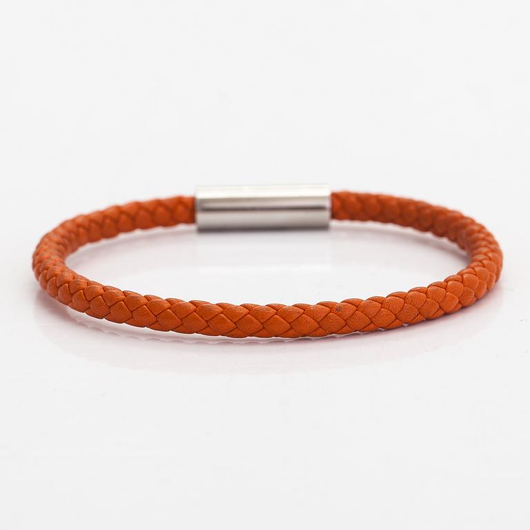 Hermès, A leather and metal bracelet. Marked Hermès Made in Italy.